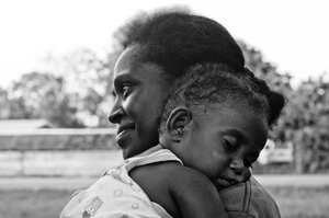 Mother Holding Her Child
