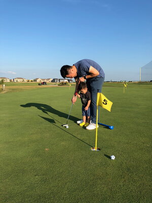 Pengfei Song Golfing with Son