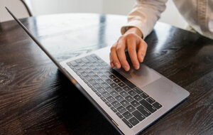 Typing on Laptop